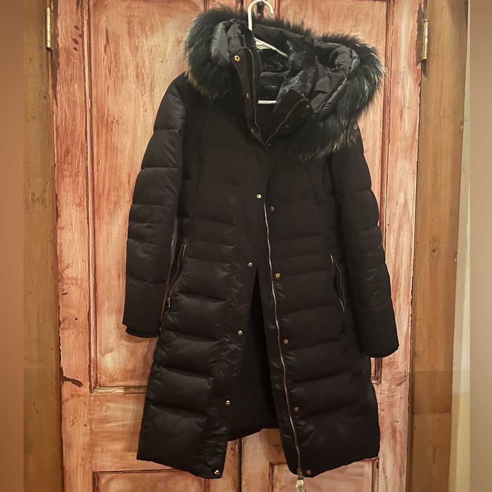 Zara looking down coat with Moncler logo on shoulder and genuine fur hood